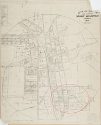 a map of a city with a red circle in the middle