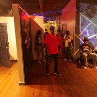 a group of people standing in a room